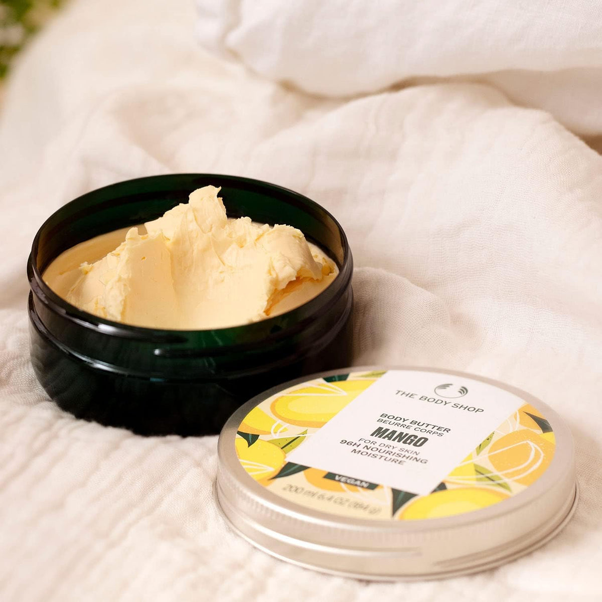 The Body Shop close-up of shea and mango oils highlighting nourishing natural ingredients