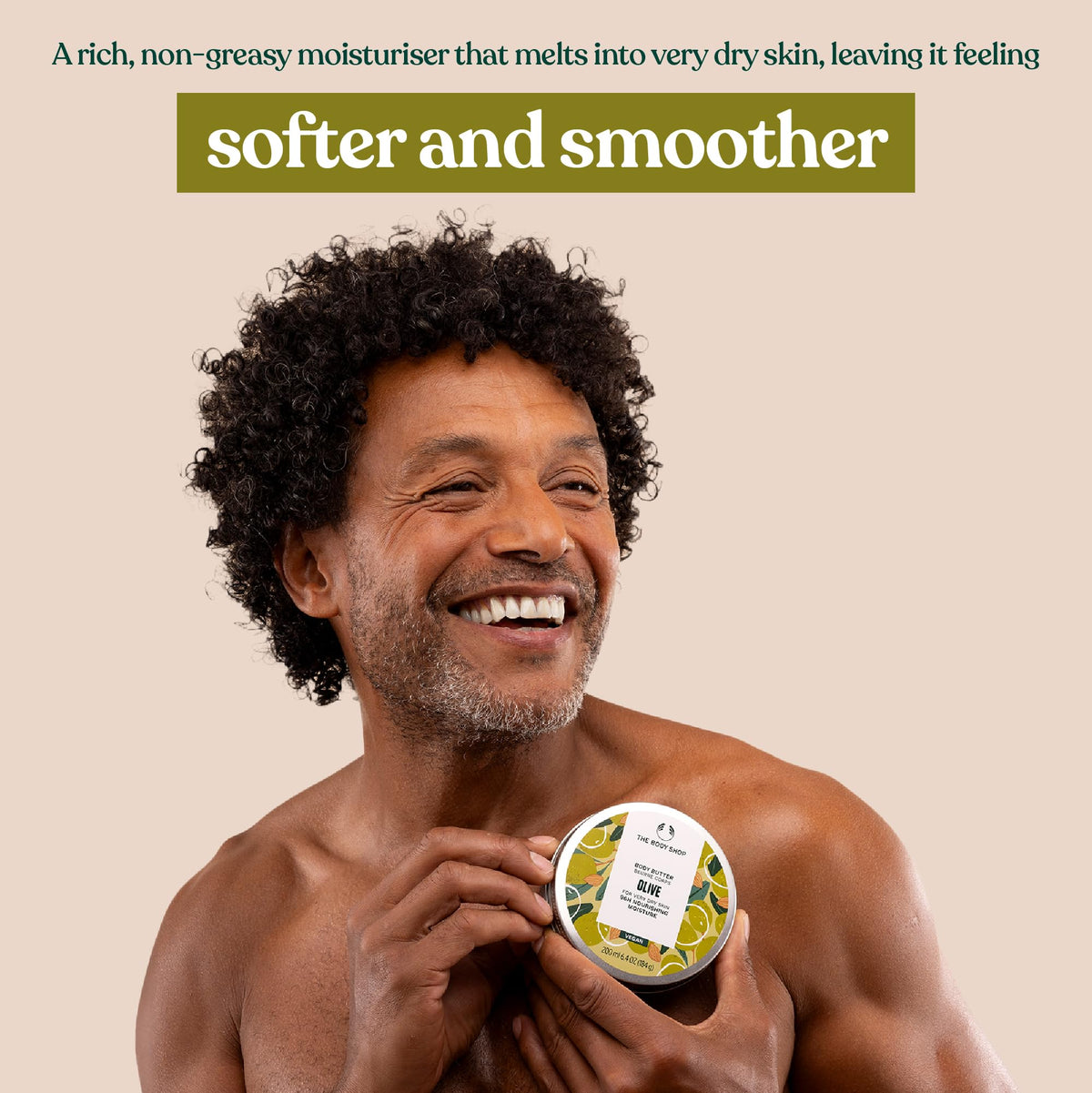 The Body Shop olive body butter jar beside olives and shea showcasing natural ingredients
