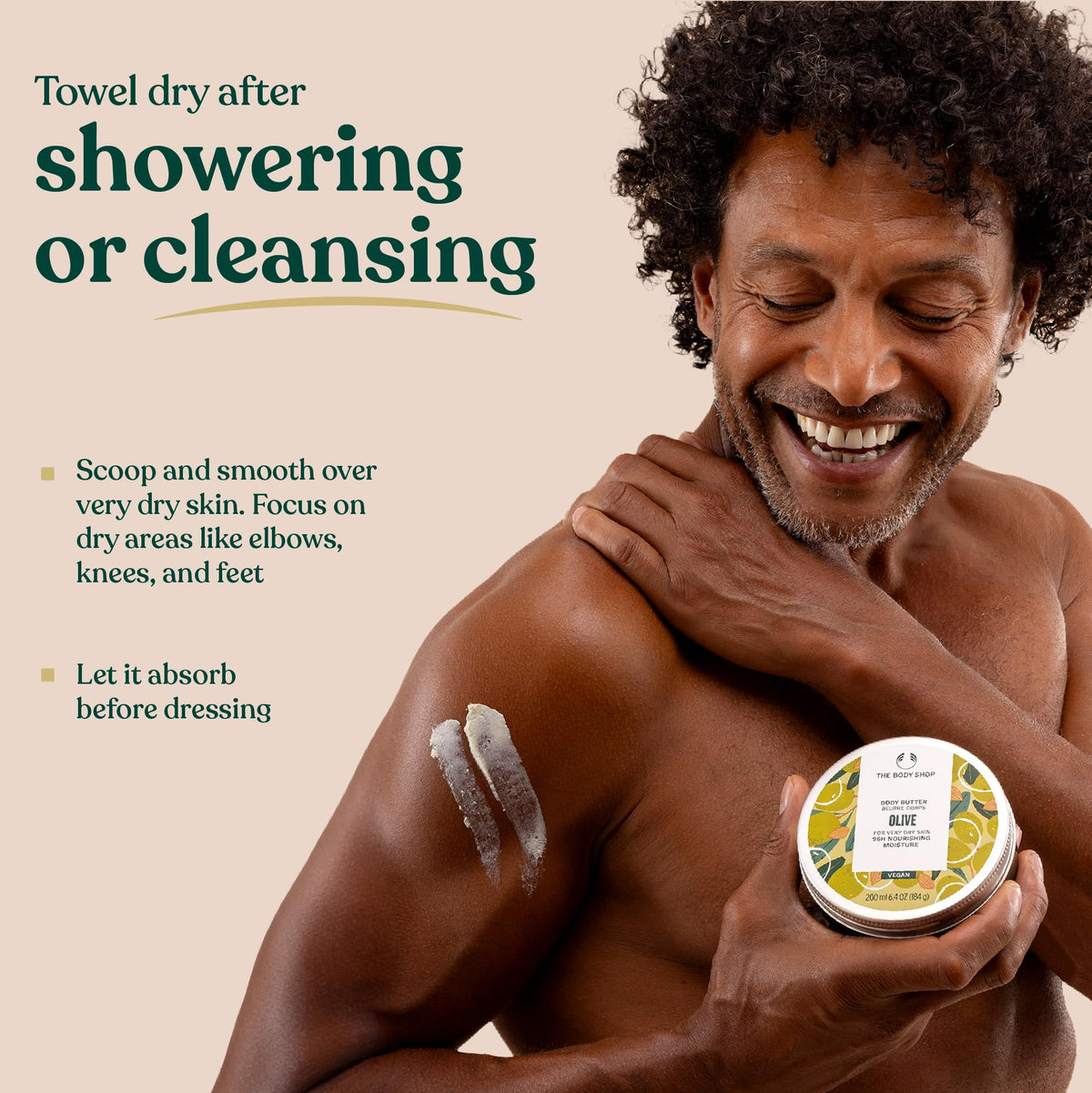 The Body Shop olive body butter on a bathroom shelf showing everyday skincare use