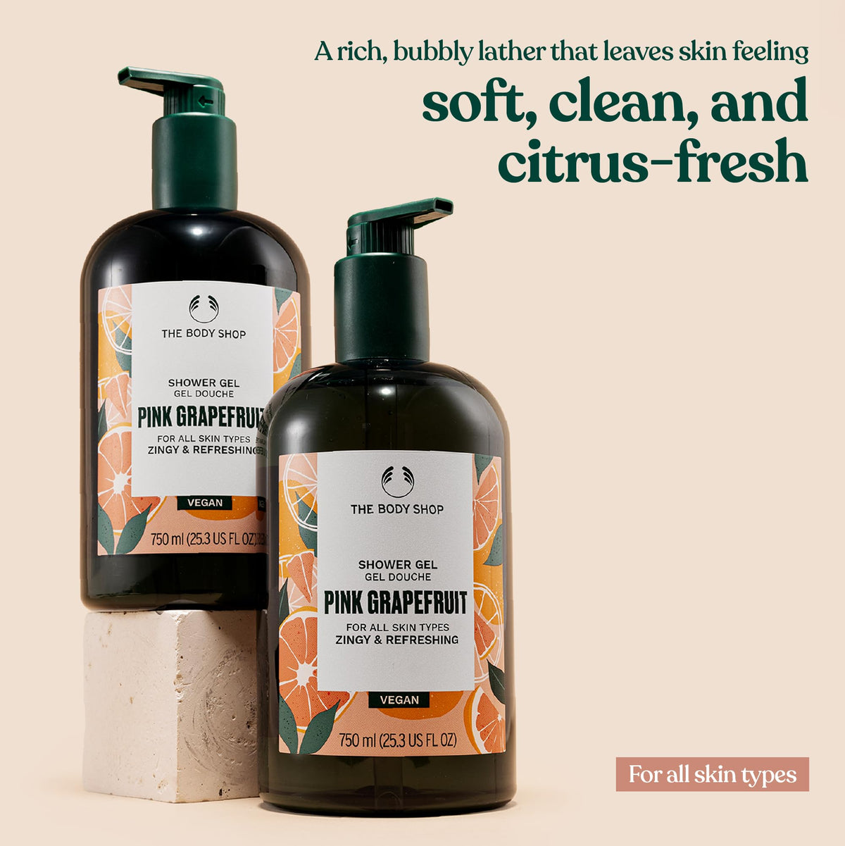The Body Shop pink grapefruit gel being poured with foaming action benefit