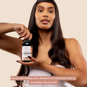 250ml bottle next to a hand for scale showing The Body Shop size convenience