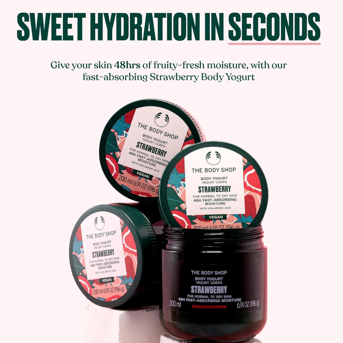 The Body Shop strawberries and almond milk ingredients highlighting natural sourcing