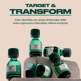 The Body Shop tea tree dropper releasing a drop for precise, targeted application