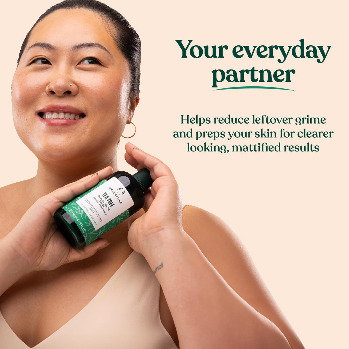 The Body Shop tea tree in-hand scale showing 250ml size and travel practicality