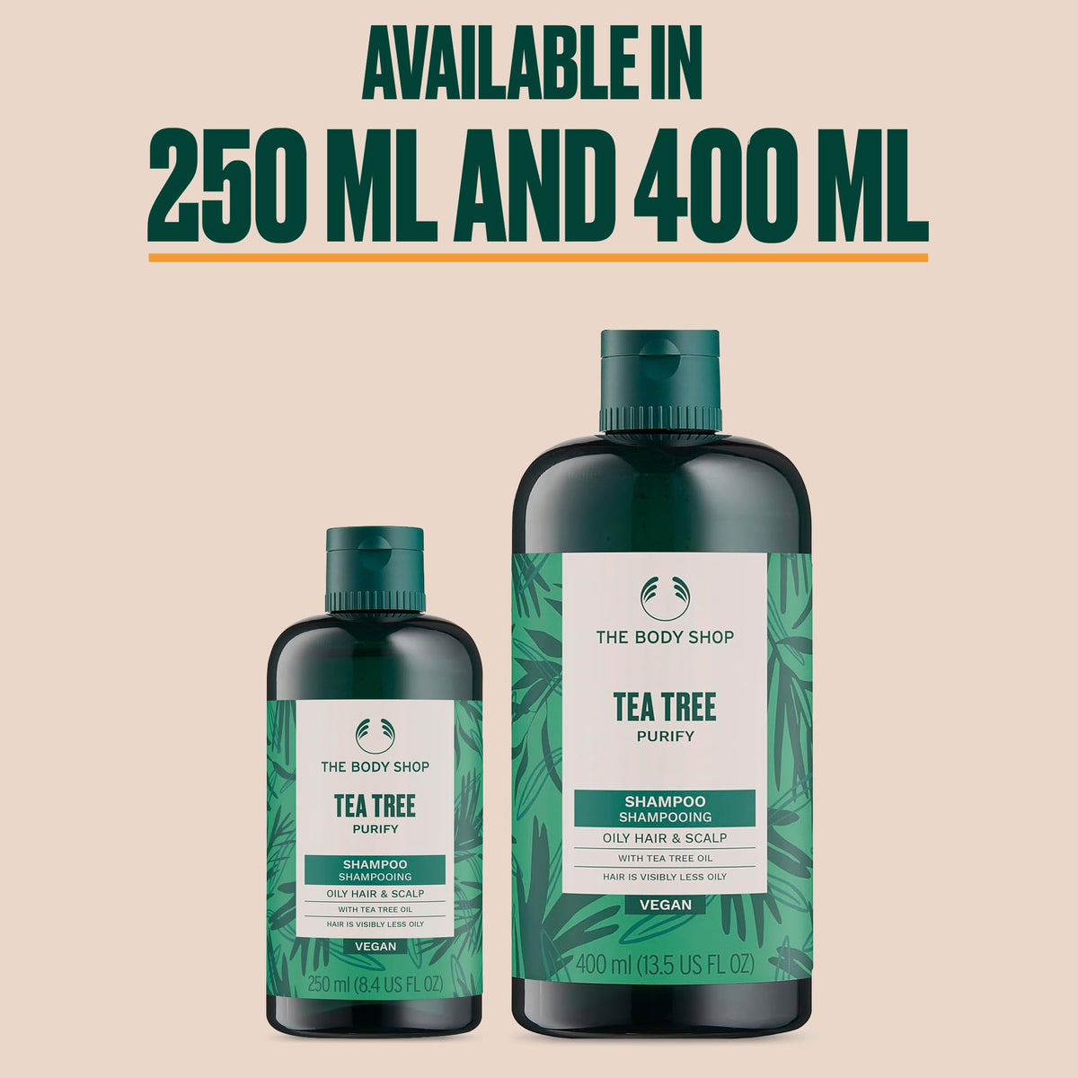 The Body Shop bottle with fresh tea tree leaves highlighting natural origin