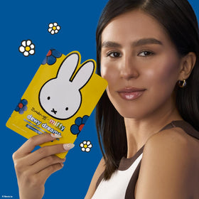 The Crème Shop mask applied on model demonstrating comfortable fit and instant dewy finish