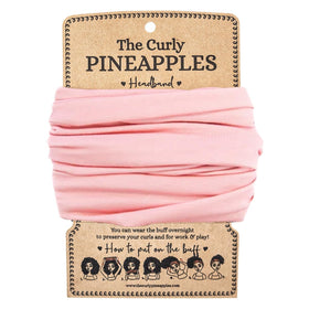 The Curly Pineapples front view showing bubblegum pink band and secure hold benefit