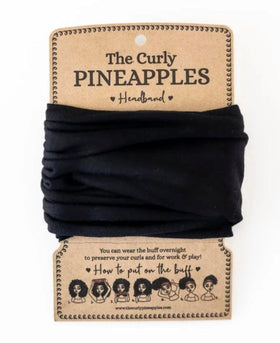 The Curly Pineapples front view of matte black headband shows shape and wearable style