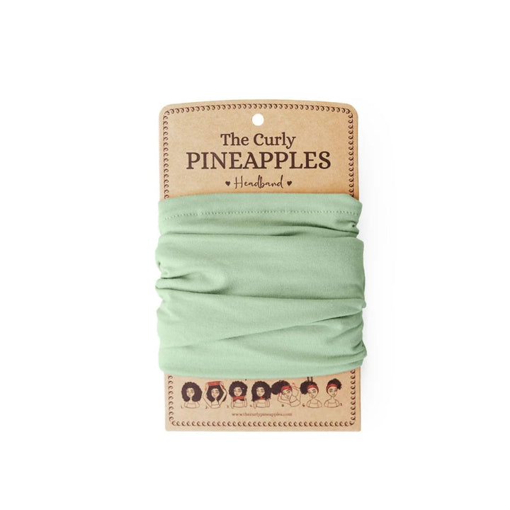 The Curly Pineapples front view of mint green headband showing full-width coverage and comfort