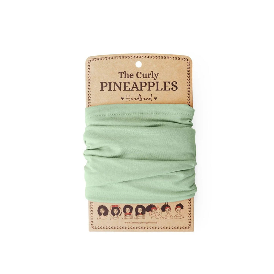 The Curly Pineapples front view of mint green headband showing full-width coverage and comfort