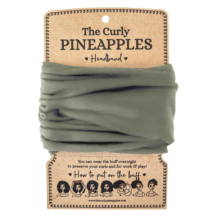 The Curly Pineapples front packaging showing olive headband and benefits
