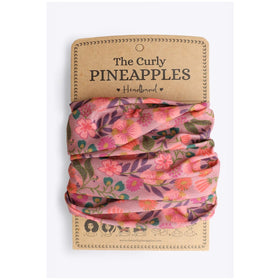 The Curly Pineapples front packaging in plum blush showing style and size — easy selection benefit