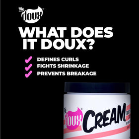 The Doux cream on hand being applied to hair for easy styling