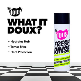 The Doux applied to curly hair in shower demonstrating hydration benefit