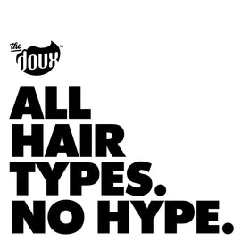 The Doux product on a vanity with styled curls showcasing shine and touchable finish