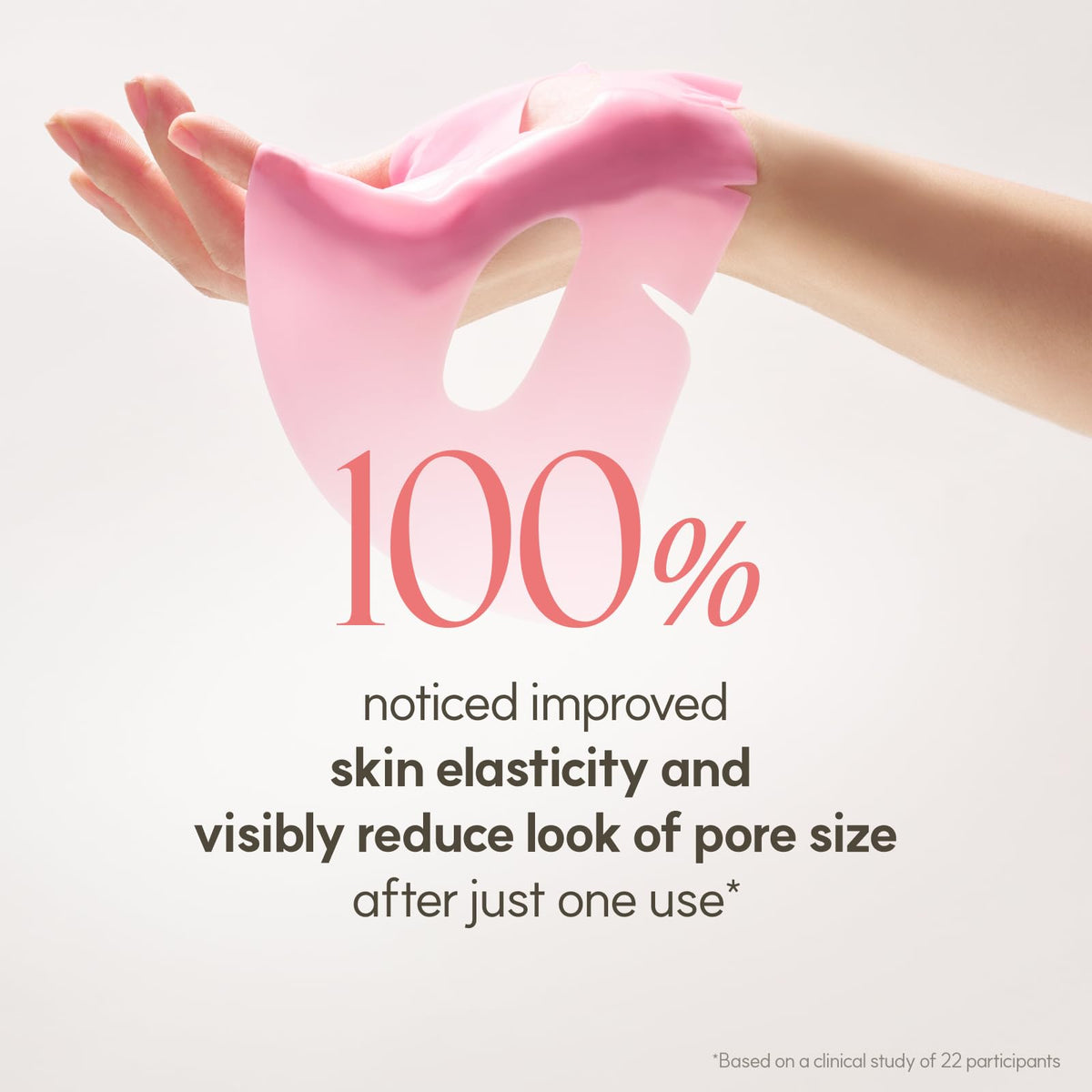 The Face Shop mask next to a hand for scale to show sheet size and coverage