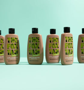 THE FOX TAN lifestyle beachside use conveying glowing tan and easy layering