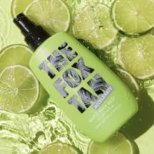 THE FOX TAN mist being applied to arm illustrating even coverage and ease