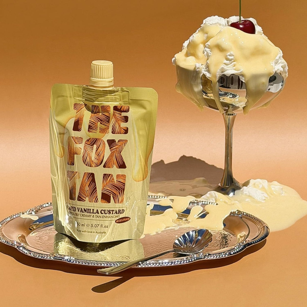 THE FOX TAN 150mL bottle next to common object showing size and travel-friendly convenience