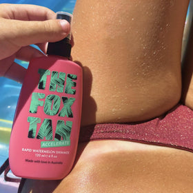THE FOX TAN swatch on forearm revealing deeper tan and blurred imperfections