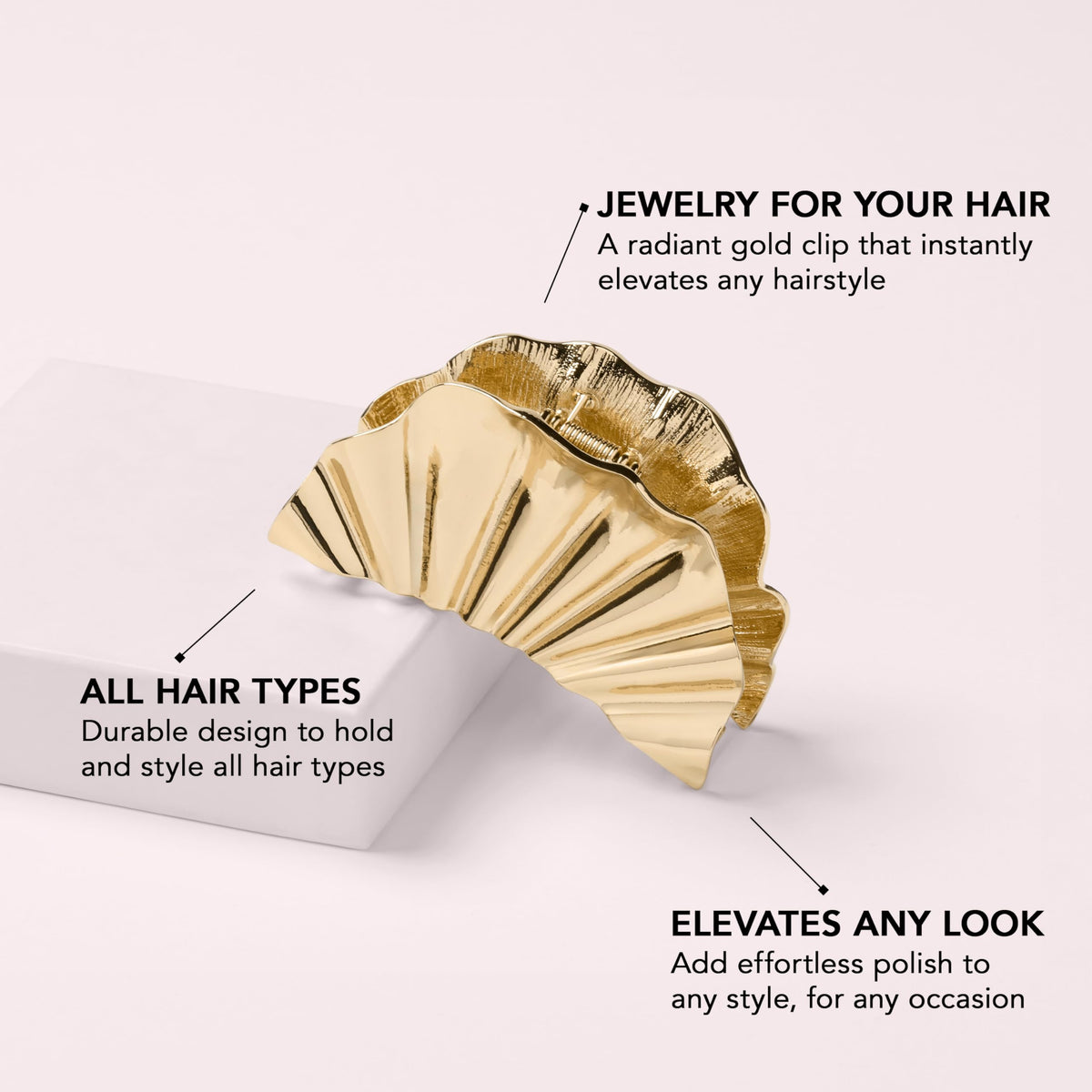 The Hair Edit golden hour held in hand to show size and confident weighted feel