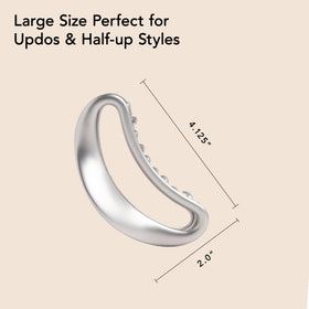 The Hair Edit clip holding a high bun showing reliable updo support benefit