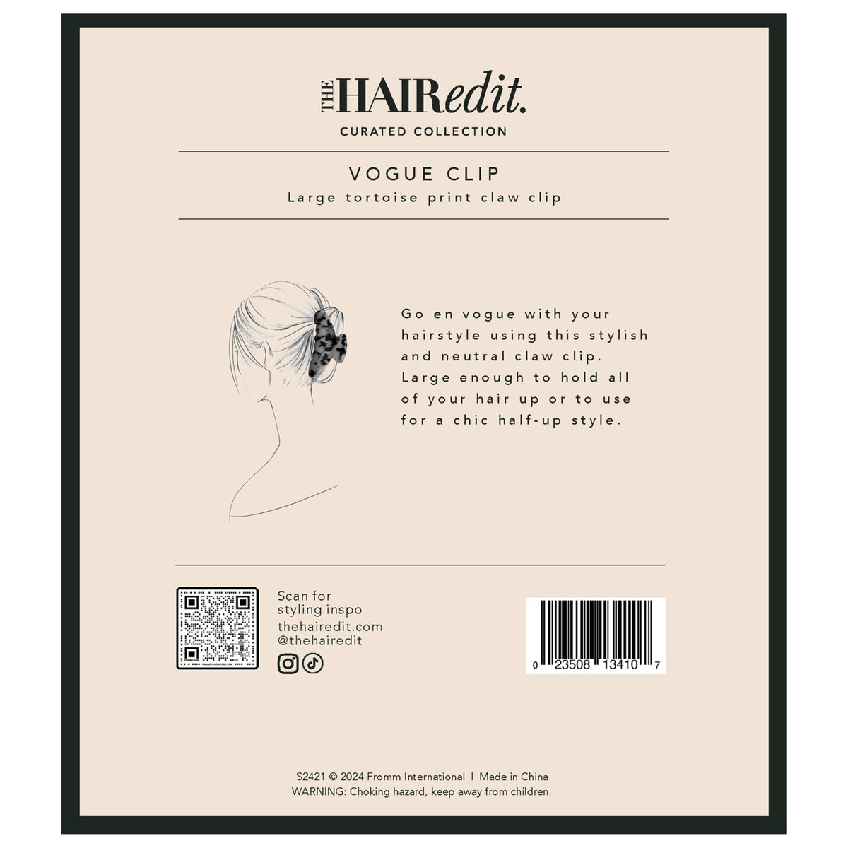 The Hair Edit scale next to hand illustrating large size and capacity