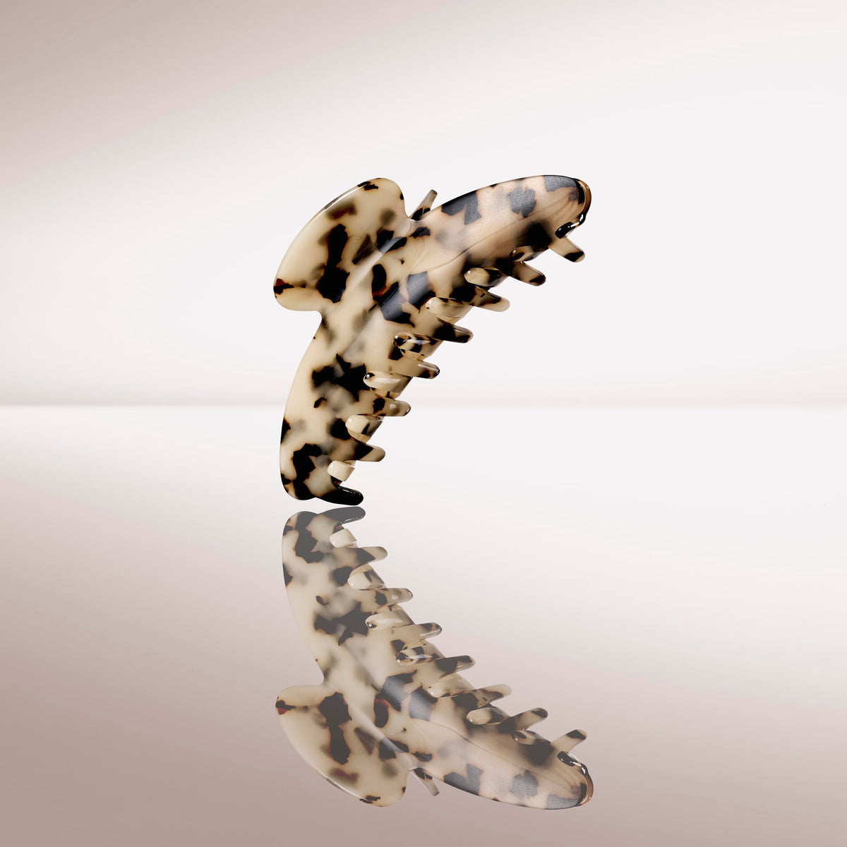 The Hair Edit texture detail of tortoise pattern for polished neutral styling