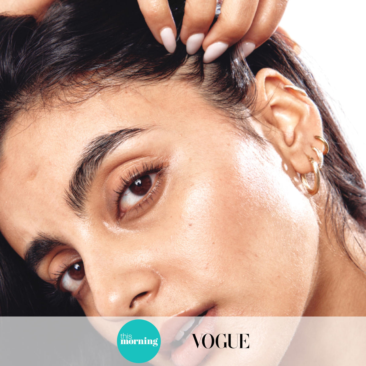The INKEY List single serum droplet on skin illustrating hydration benefit