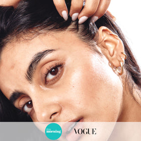 The INKEY List single serum droplet on skin illustrating hydration benefit