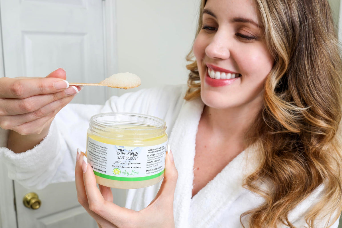 The Keys Salt Scrub scoop on hand demonstrating easy application