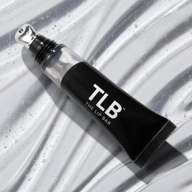 Metal applicator close-up of The Lip Bar cooling tip for precise, soothing application
