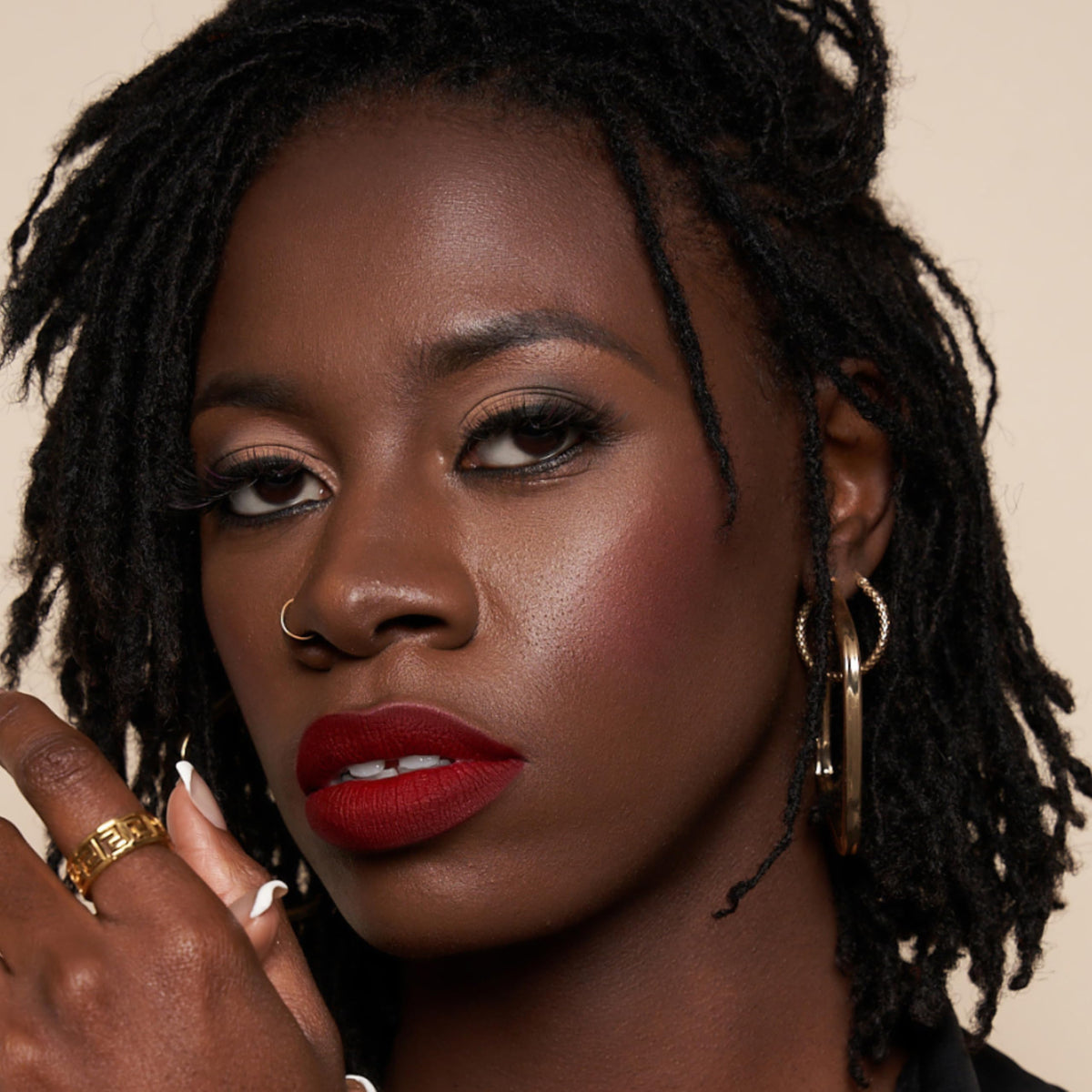 The Lip Bar lifestyle evening look showing bold color for nighttime confidence