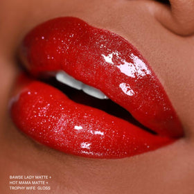 The Lip Bar label and ingredients shot highlighting jojoba oil and vitamin E benefits