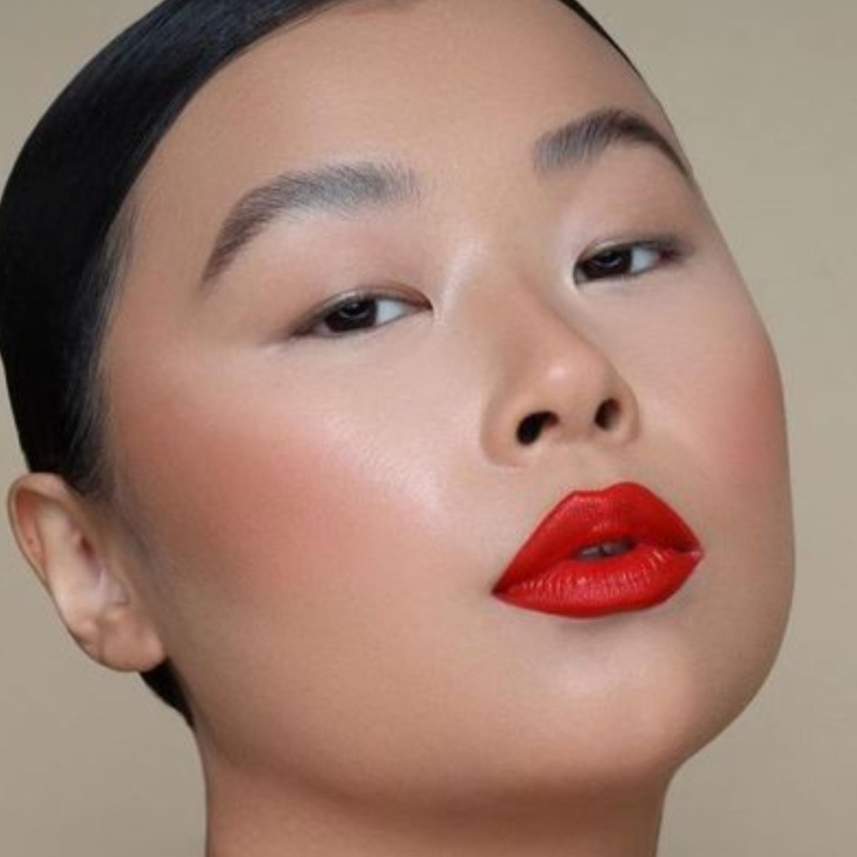 Lifestyle evening look featuring The Lip Bar Boy Trouble delivering high-impact color and confidence