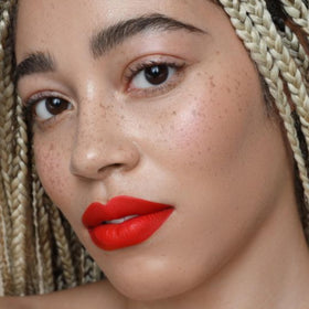 The Lip Bar Boy Trouble displayed with Juicy Pout duo indicating prep for smooth, long wear