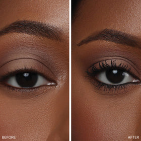 The Lip Bar mascara applying to lower lashes for defined, clump-free detail