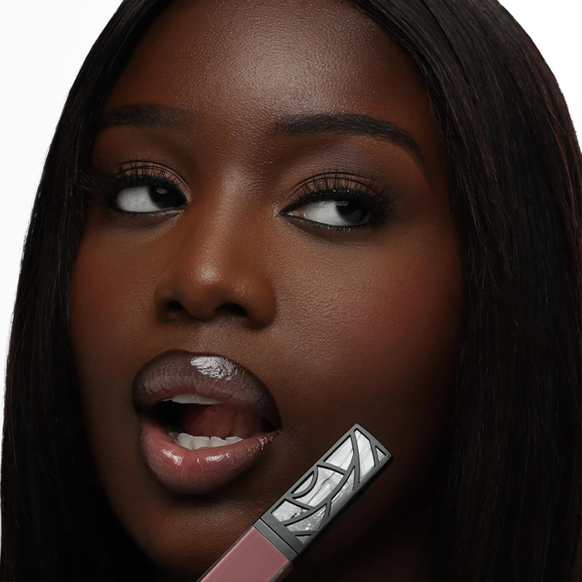 The Lip Bar doe-foot applicator close-up demonstrating smooth, precise application