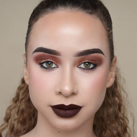 The Lip Bar applicator and liquid texture swatches showing smooth glide and true pigment