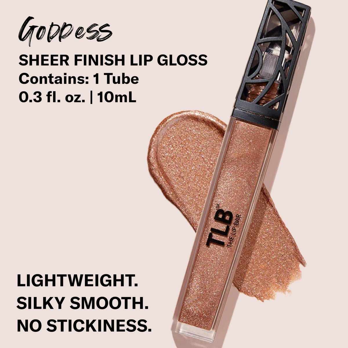The Lip Bar doe-foot applicator loaded with gloss for precise, smooth application