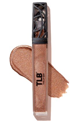The Lip Bar front packaging showing golden-bronze gloss sheen and brand logo