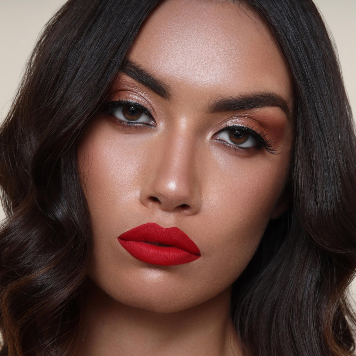 The Lip Bar Hot Mama layered with gloss showing shine transformation, versatile styling benefit