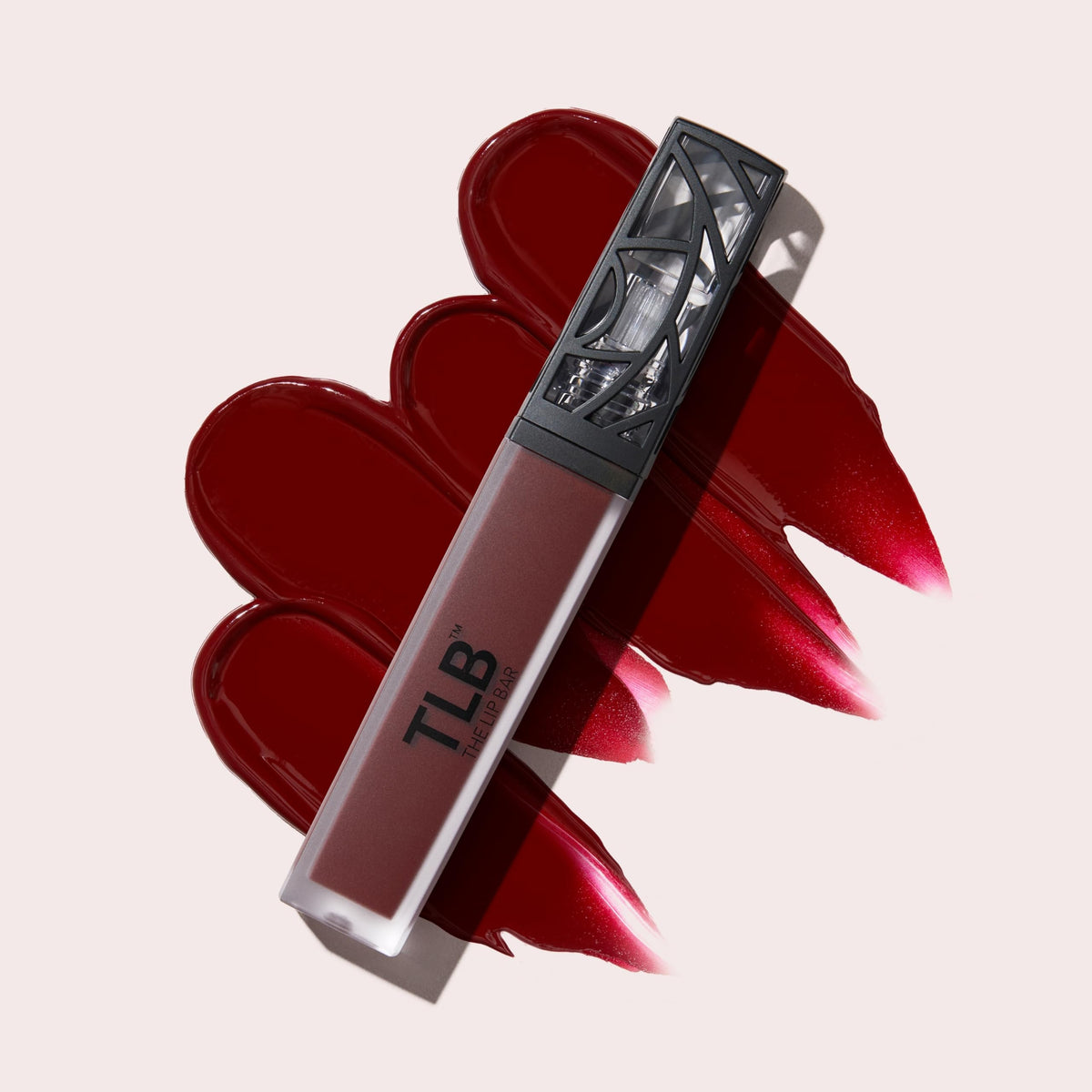 The Lip Bar on model wearing Mastermind deep blood red for confident look