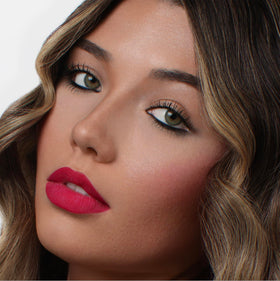 The Lip Bar lipstick applied on lips, showing comfortable longwear effect