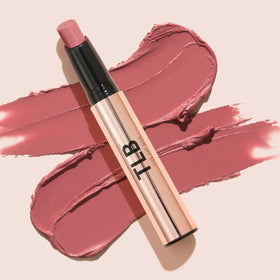 The Lip Bar jojoba and kahai oil droplets highlighting conditioning ingredients benefit: nourished lips