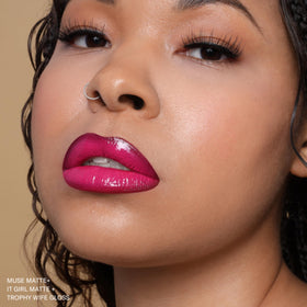 The Lip Bar Muse lifestyle evening look showing bold deep-berry shade for confidence