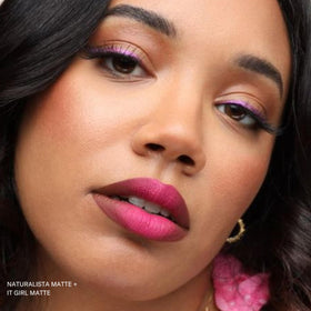 The Lip Bar Naturalista beside a coin showing .24 fl oz size and travel convenience