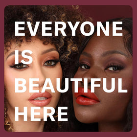 The Lip Bar packaging label and ingredients displaying jojoba oil and vitamin E