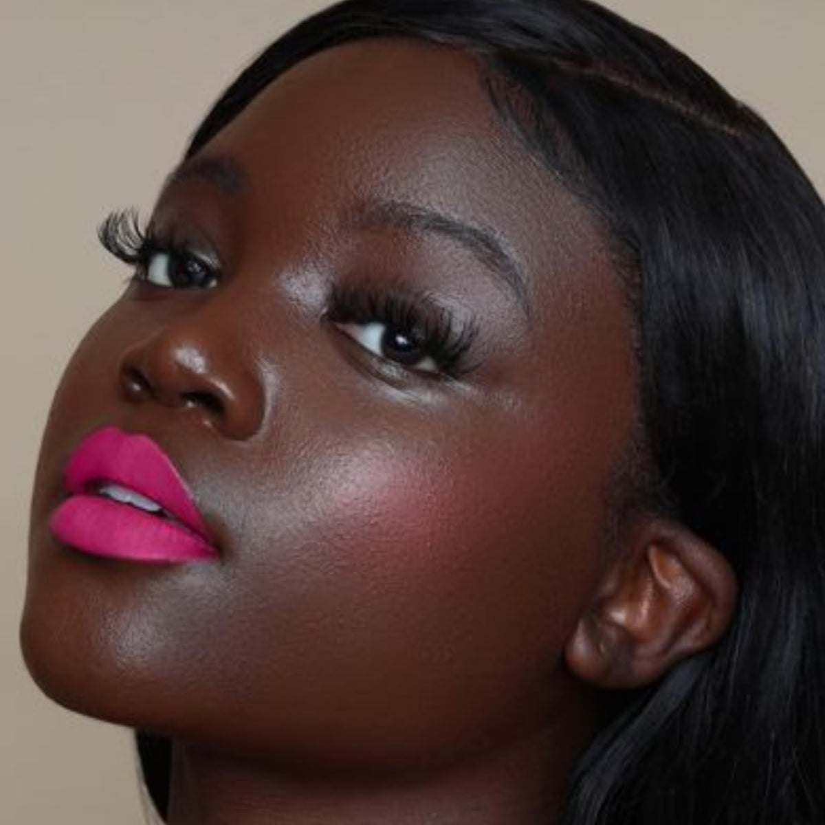 The Lip Bar product with jojoba oil and vitamin E visuals highlighting conditioning