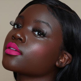 The Lip Bar product with jojoba oil and vitamin E visuals highlighting conditioning